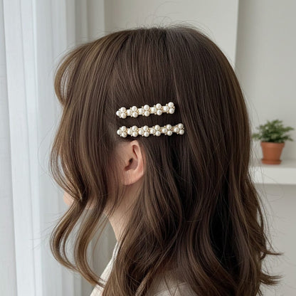 Alpha 55 Set de 2 barrettes perles dorées – Élégance chic